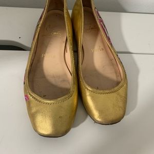 Christian louboutin gold flats